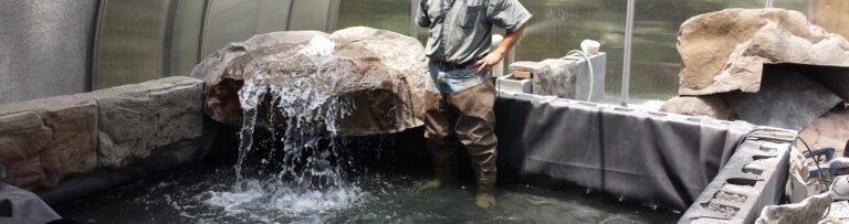 Man-made Boulder fountain test boulder installed