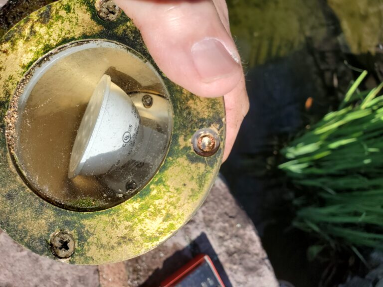 stripped brass screw in submersible light