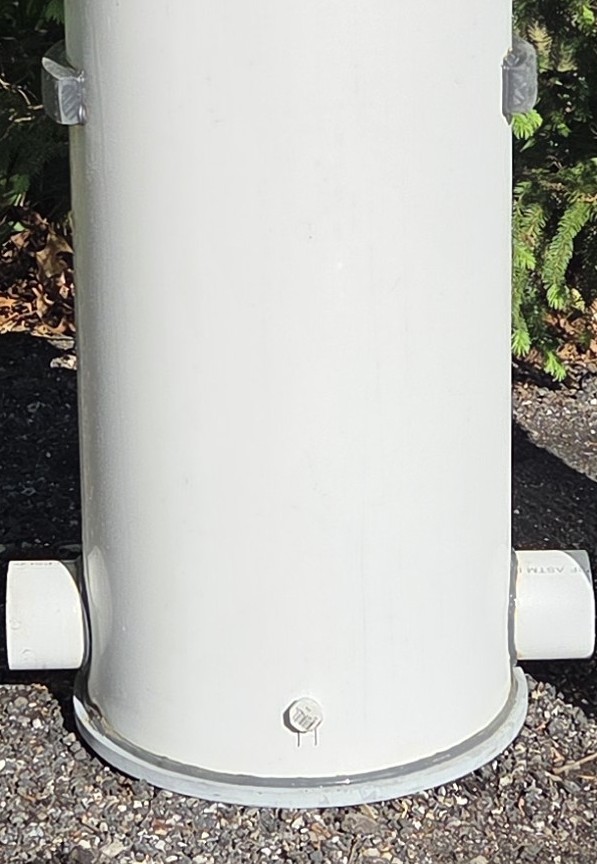 Close-up of the tanks bottom and drain plug